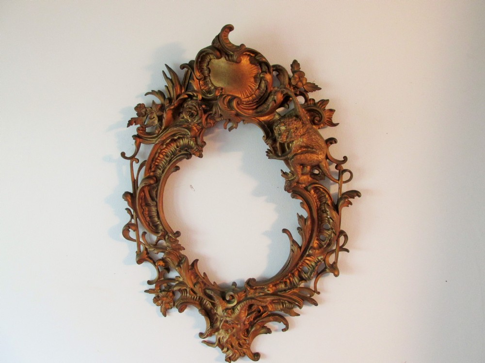 very unusual gilt bronze frame monkey etc